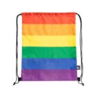 Drawstring bag with a rainbow pattern featuring horizontal stripes in red, orange, yellow, green, blue, and purple. Black straps are attached at the top corners and bottom sides. A small black tag is visible on the side.