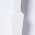 Close-up of a white object with an embossed design of a bottle and recycling symbol, including the text RPET. The background is plain white.