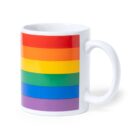 A white mug displaying horizontal rainbow stripes in red, orange, yellow, green, blue, and purple. The mug is positioned against a plain white background.