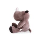 Side view of a plush rhinoceros toy sitting upright. It has a soft brown body, small black eyes, a white horn, and dark brown accents on its ears and feet. A small tail is visible at the back.