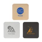 Three square-shaped coasters with logos: top is beige with blue waves and Travel; bottom left is gray with a mountain logo and Travel Design; bottom right is black with an abstract orange figure and Company.