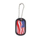 A dog tag with a ball chain, featuring an American flag design. The flag shows red and white stripes and a blue field with white stars, set against a black border.