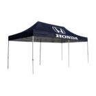 A large blue canopy tent with a peaked roof, supported by metal poles. The tent displays the Honda logo and the word HONDA prominently on the roof fabric.