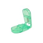 A green plastic pill cutter with an open lid, revealing a small blade inside. The base has a compartment to hold pills.