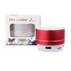 A red and white portable mini speaker is displayed next to its box. The box is labeled Mini Speaker A10-1 and features an airplane graphic and the text Enjoy Music Enjoy Life at the bottom.