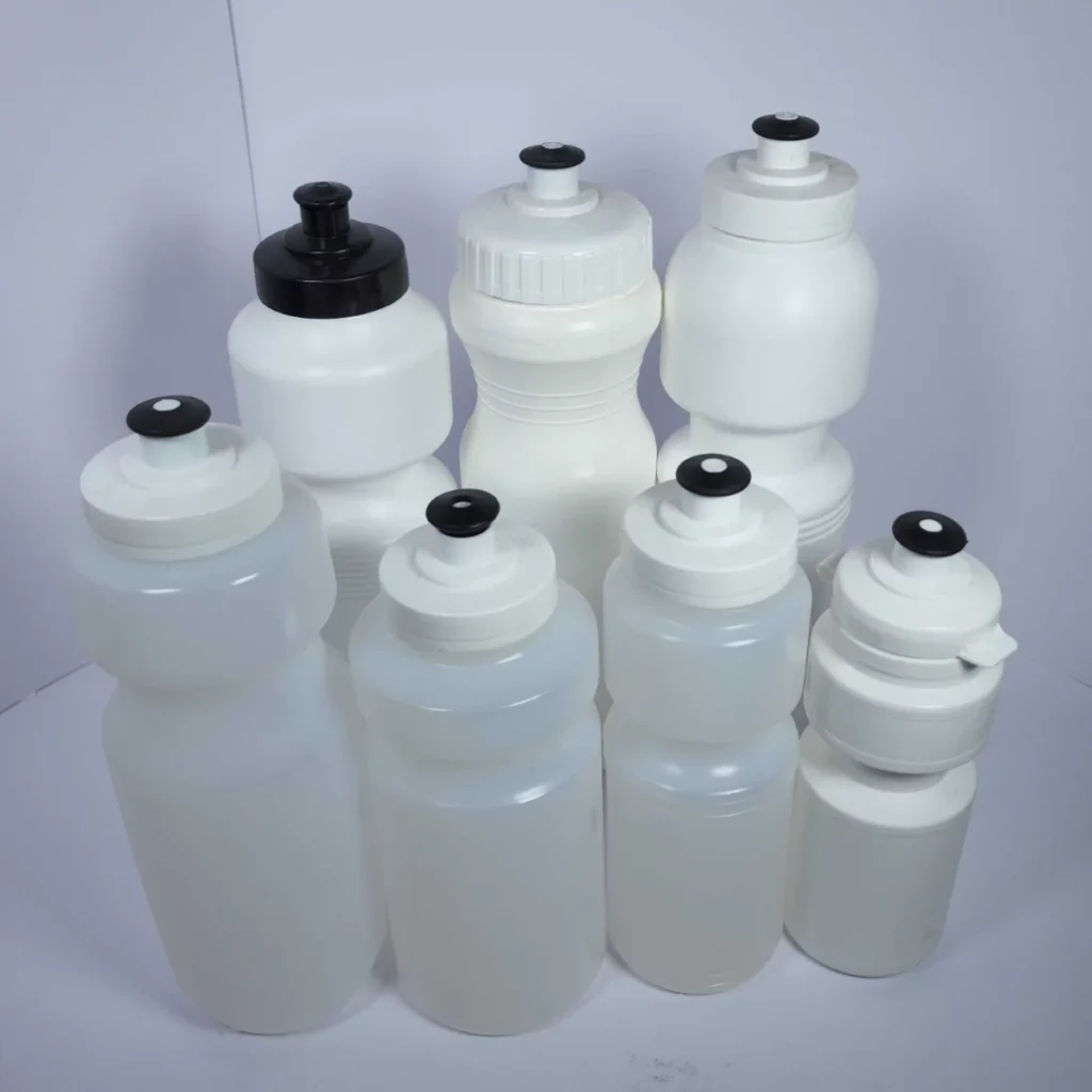 white drink bottles in different lid types, styles, and sizes