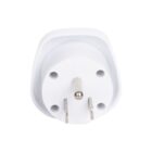 Image of a white electrical plug adapter with three metal prongs, designed for use with European sockets. The adapter is simple and compact, suitable for travel or home use.