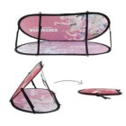 Pop-up pink soccer goal with black frame featuring dynamic illustrations of athletes printed on the net. The image shows the goal partially open and fully collapsed for easy storage.