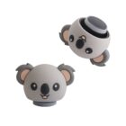Two portable Bluetooth speakers in the shape of cute koalas are shown. One is upright, displaying its face, while the other is upside down, revealing the speaker component on top. Both are gray with black noses and ears.