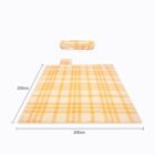 A yellow plaid picnic blanket is spread out, measuring 200cm by 200cm. Behind it, a matching rolled-up blanket is shown.