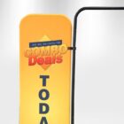 A yellow standing sign with the words Combo Deals Today in red and blue text. The sign promotes limited-time offers. Its partially visible against a plain background.