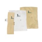 Three fabric pouches, two beige and one white, with a silhouette of a standing person in green. The beige pouch is rolled up, and all have snap closures.