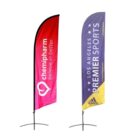 Two teardrop flags on stands. The left flag is red with chemipharm believe in better in white. The right flag is purple and yellow with Los Angeles Premier Sports and Adidas logos in white and yellow.