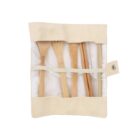 A set of bamboo utensils including a fork, knife, spoon, straw, and chopsticks, neatly organized in a beige fabric case with a button closure.