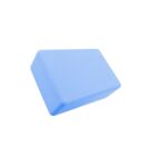 A blue yoga block with beveled edges, set against a plain white background.