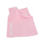 A pink sports towel with white text reading arena and a logo on the bottom left corner. The towel is laid out flat with slight folds, showcasing its soft texture.