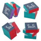 Four different views of a twistable calendar cube puzzle. Each cube face displays CC 2021 or 2021 and is composed of multicolored squares including blue, red, purple, and teal. Some cubes are partly twisted or open.
