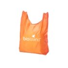 An orange reusable shopping bag with the white text bioisland and a small bird silhouette printed on it. The bag is standing upright against a plain white background.
