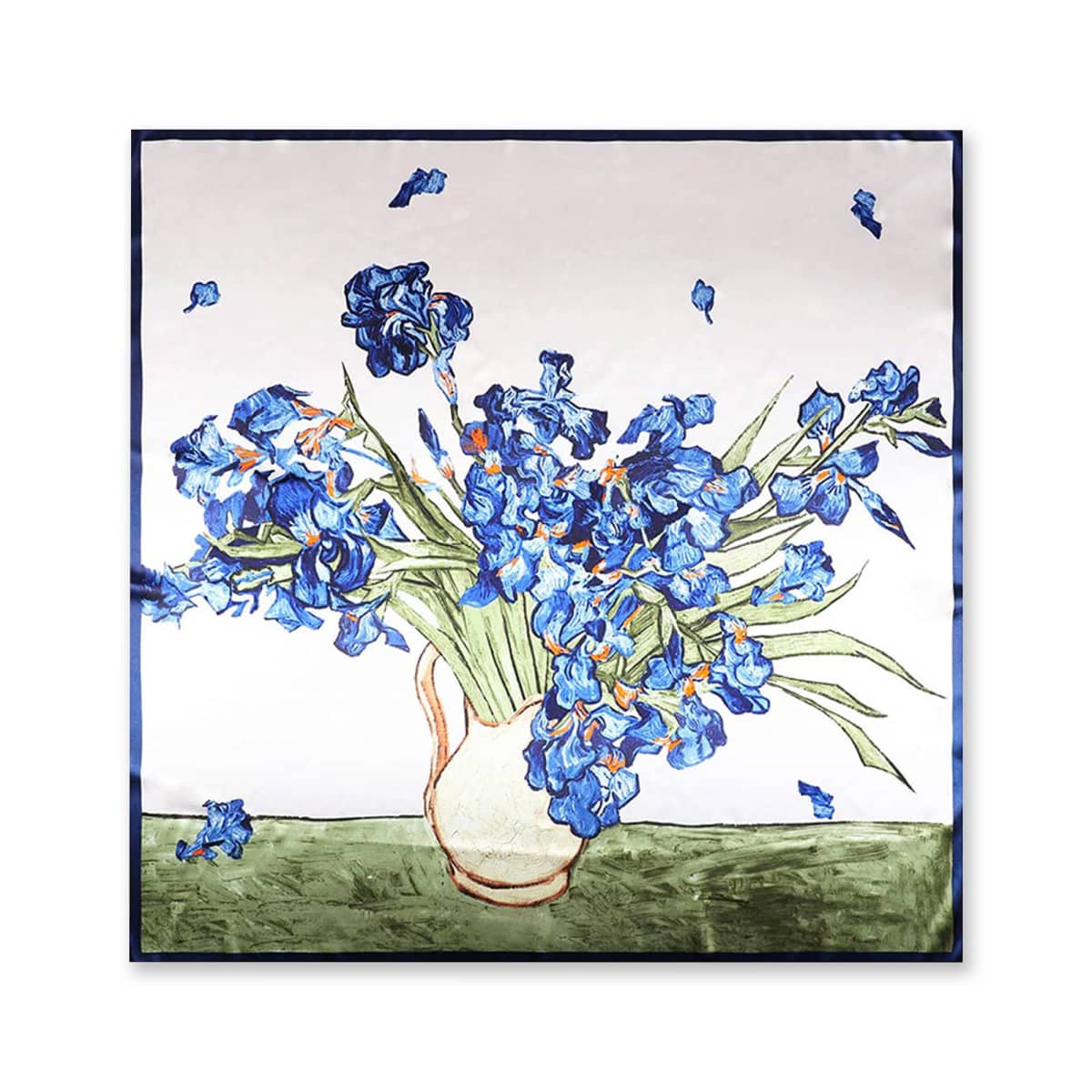 A silk scarf featuring a print of vibrant blue irises in a beige vase, set against a light background. Some petals appear to be falling, adding a dynamic touch to the artwork. The border is a simple, narrow blue line.