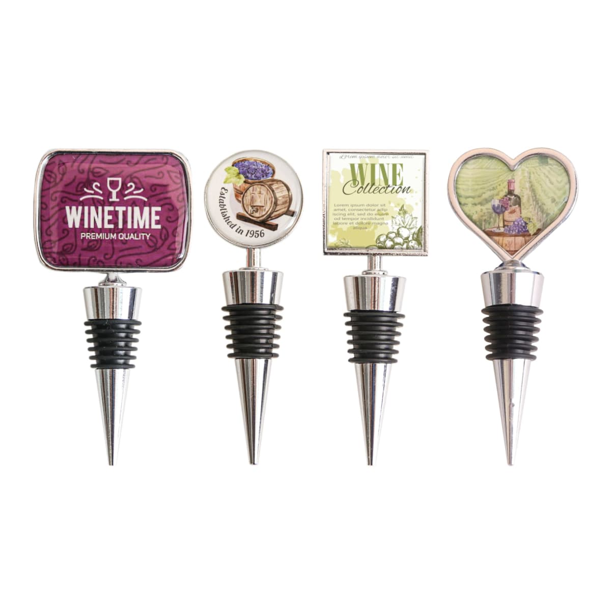 Four decorative wine stoppers are displayed. They feature various designs: a square WINETIME graphic, a circular vineyard illustration, a square WINE Collection label, and a heart-shaped vineyard scene. All have metal and rubber bases.