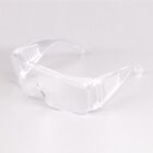 Clear safety glasses with a wraparound design on a white background.