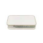 A minimalist, rectangular, white wireless charging pad with rounded edges, featuring a small control panel with buttons on the side.