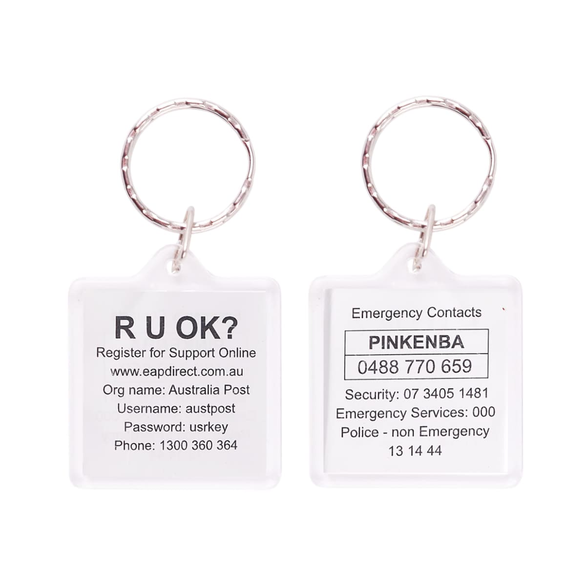 A keychain with two sides. One side has “R U OK?” and details for registering. The other lists emergency contacts under “PINKENBA,” with various emergency numbers and services.