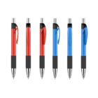 Image of six ballpoint pens with a white background. Three pens have red bodies, and three have blue. Each pen has a retractable tip, black rubber grip, and clip on the side. They are aligned in two neat rows, alternating colors.