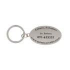 Oval metal keychain with engraved text: Labane, Ardrahan, Co. Galway, 091-635231, www.quinncarsales.com.