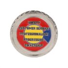 A round silver coin with a red, blue, and yellow background features the words Safety, Customer Service, Professionalism, Progressive, Ownership in bold black letters.