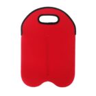 A red neoprene lunch bag with a black trim and a cutout handle. The bag has a sleek, rounded design with subtle stitched details down the center.