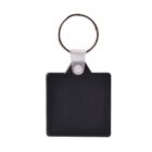 A square black keychain with a metal ring attached at the top.