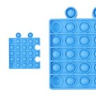 Two blue pop-it fidget toys against a white background. The left one is smaller with two rows and two circular protrusions on top. The right one is larger with five rows and two circular protrusions. Both have pressable bubbles.