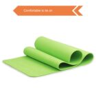 Green exercise mat partially rolled up, with an orange arrow in the top left corner containing the text Comfortable to lie on.