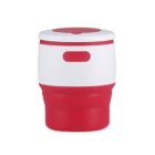 A red and white insulated container with a round shape. The base is red, the middle is white with a small red rectangular detail, and the lid is white with a central red circle. It is designed for keeping food warm or cold.