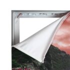 A close-up of a partially unzipped fabric frame, revealing an LED light strip inside. The fabric displays a printed image of a mountainous landscape under a pink sky. The frame is metallic and rectangular.