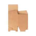 Flat, unfolded cardboard box on a white background, showing its cut-out shape with flaps and tabs designed for assembly. The cardboard is brown and empty, demonstrating its potential for packaging use.