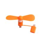 Orange portable USB fan with dual blades, featuring a removable Lightning connector for adaptable use with various devices.