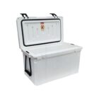 A white cooler box with a hinged lid open, showing a spacious insulated interior. It has black handles on the sides and two black latches on the lid. The lid also features a warning sticker.