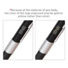 Close-up of a black pen with a silver clip. The pen has a logo engraved near the top. Text above notes that due to the pens material, the logo color may vary between gold, yellow, or silver.
