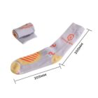 Gray sock with orange and yellow patterns, measuring 205mm in length and 200mm in height. The sock has a graphic and text near the top. Another matching sock is rolled up nearby.