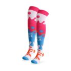 Colorful knee-high socks with a vibrant design, featuring pink tops with white splashes, transitioning to blue with colorful dots and the words MAGIC WALK in white. The toe and heel areas are blue and orange.