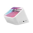 White, angled portable speaker with a colorful geometric design on the top surface. The front has buttons and a USB port. The words Portable and TX500NA / TX500PA are visible on the top.