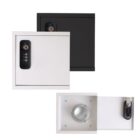 Two locked safes, one black and one white; the white one is partly open.