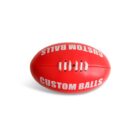 A red rugby ball with white laces and text that reads CUSTOM BALLS on both sides. The ball is placed against a plain white background.