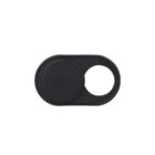 A black webcam cover in an oval shape with a sliding mechanism. One side is solid, while the other side has a circular hole, allowing it to cover or uncover a camera lens.
