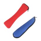 Two zipper pouches are displayed. One is red with a contrasting black zipper, shaped like a bone, while the other is blue with a black zipper, shaped like a long triangle. Both are made of fabric.