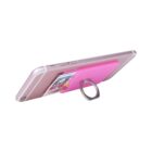 A smartphone with a pink card holder attached to the back, which also features a ring stand. The phone is positioned horizontally, showing the holder and ring from a side angle.