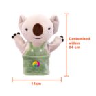 Stuffed koala puppet with a green apron, marked dimensions: 24 cm tall and 14 cm wide. Text on the right reads Customized within 24 cm.