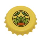 Yellow bottle cap with a circular logo featuring a stylized green leaf design and an orange base in the center, set against a white background.